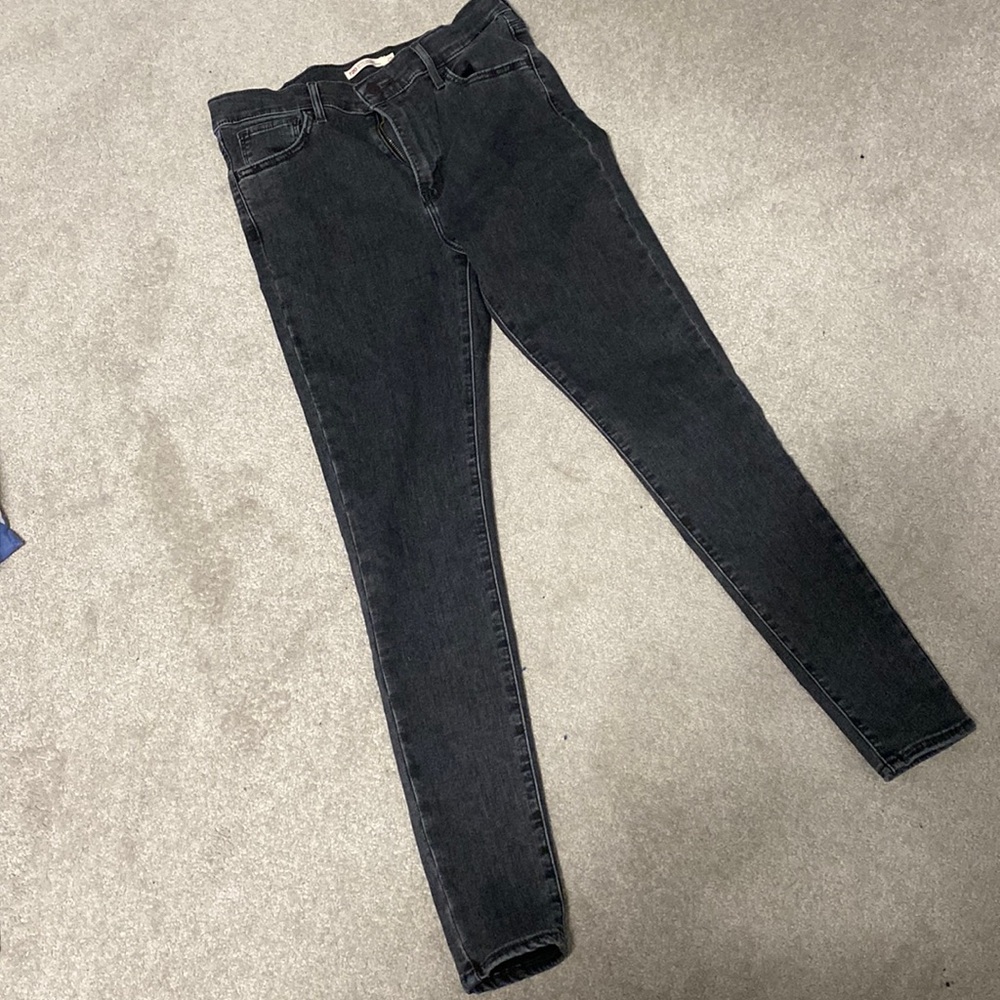 720 high rise super skinny black jeans